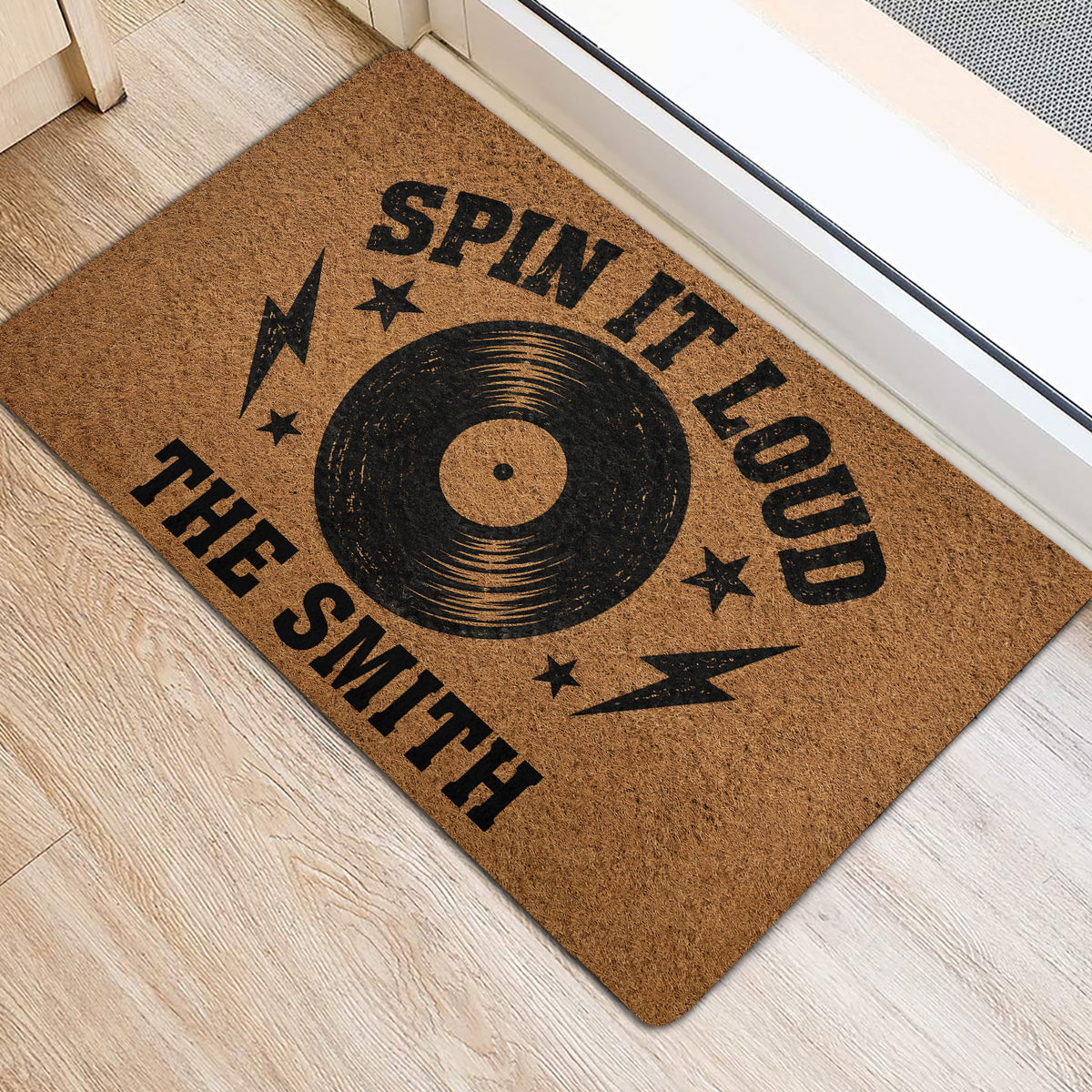 Rock and roll entryway rug with black record artwork, stars, and lightning bolt accents