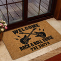 Rock and roll door mat styled in a home entryway with guitar and lightning bolt graphics