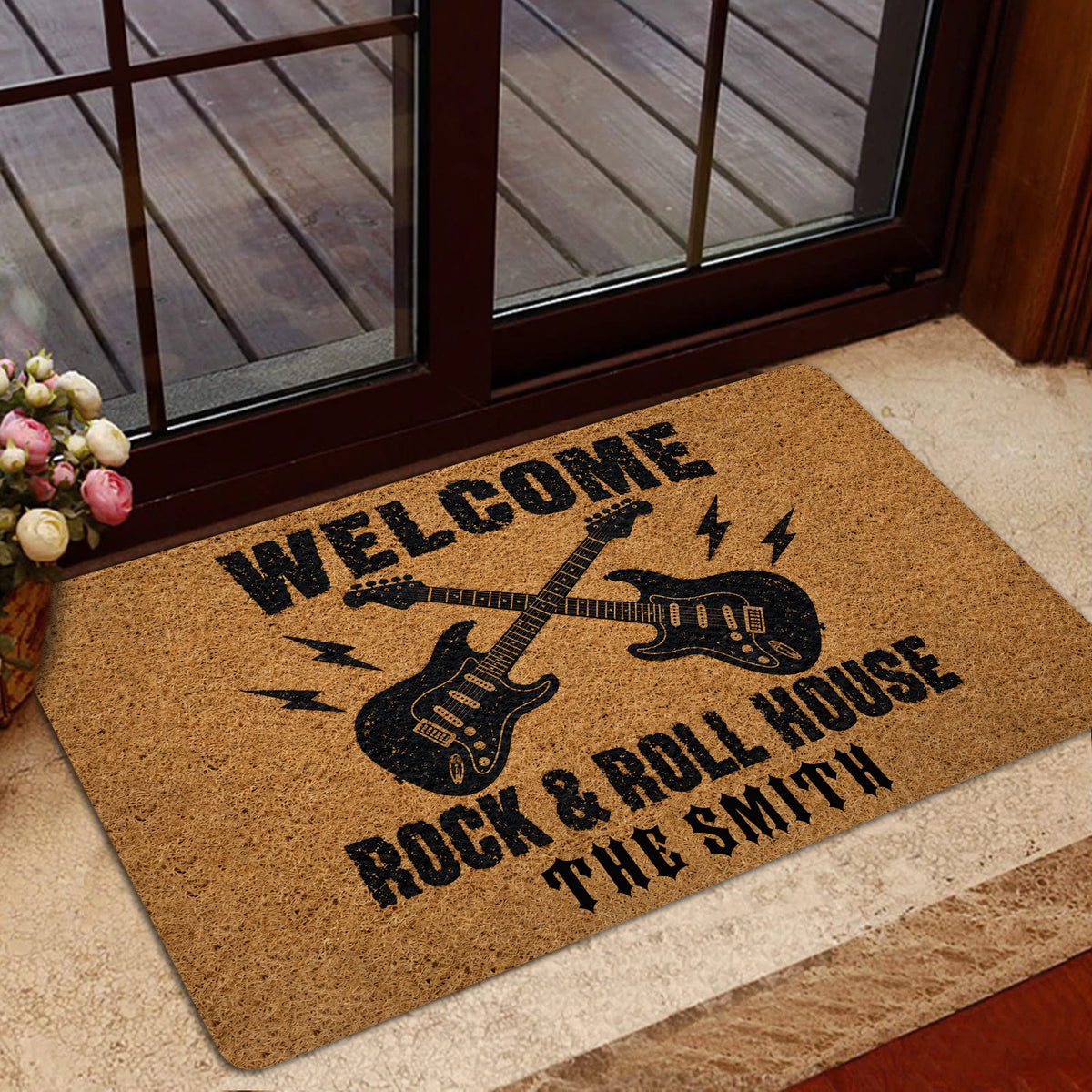 Rock and roll door mat styled in a home entryway with guitar and lightning bolt graphics