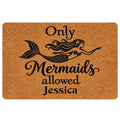 Mermaid doormat with a black mermaid silhouette, flowing hair, tail, and playful entryway message