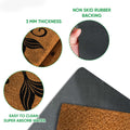 Close-up feature view of a mermaid doormat showing the printed top and dark rubber underside