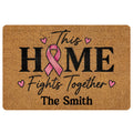 Breast cancer awareness doormat with a pink ribbon, hearts, and supportive home entryway message