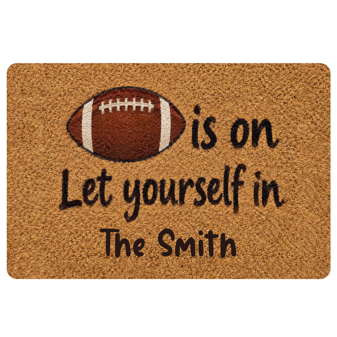 Football-themed doormat with a classic brown football graphic and welcoming black lettering