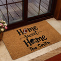 Football doormat styled in a home entrance with glass doors and warm interior decor