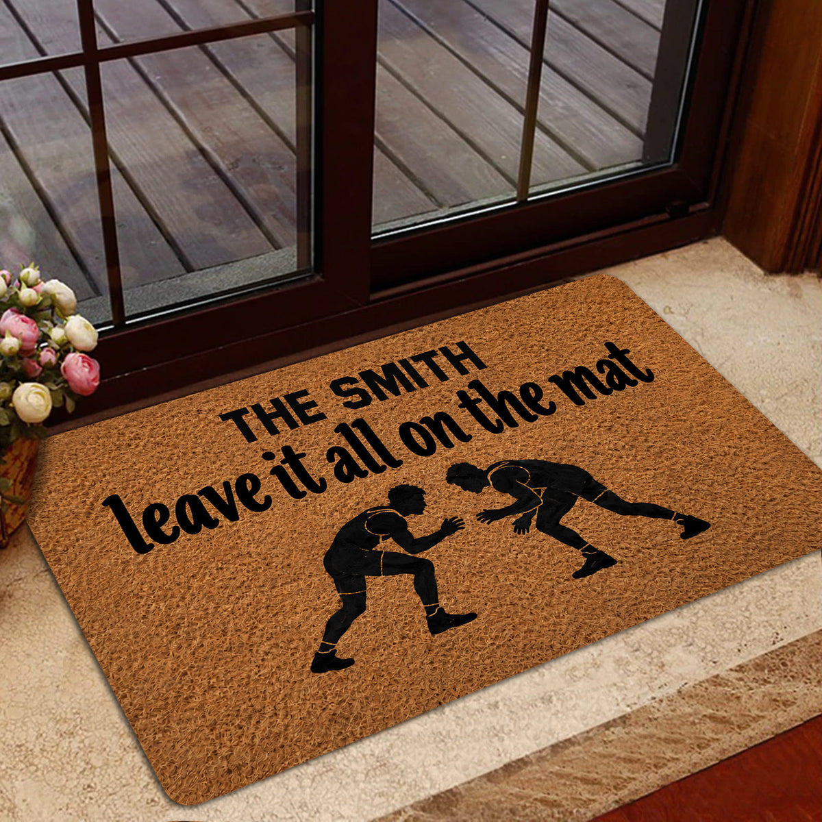 Wrestling doormat styled at a home entrance with two grapplers and a warm brown design
