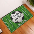 Soccer field doormat styled in a home entryway with a central soccer ball design