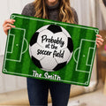 Soccer field doormat held indoors, showing the ball graphic and personalized-style lettering