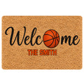 Basketball welcome doormat with orange basketball artwork and bold black and orange entryway lettering