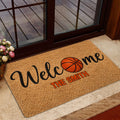 Basketball welcome doormat styled near a glass entry door and indoor foyer