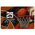 Basketball doormat with an orange basketball, hoop, court graphics, and bold black and orange artwork