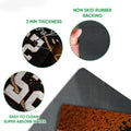 Close-up feature view showing the basketball print surface, rubber backing, and thin doormat profile