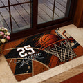 Basketball rug styled near a glass door with bold orange, black, and cream court artwork