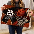 Basketball doormat held up indoors showing the full hoop, ball, court, and graphic artwork