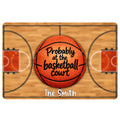 Basketball doormat with an orange basketball and court-inspired artwork in warm wood and orange tones