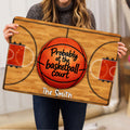 Basketball doormat held indoors showing the full court design and large orange basketball artwork