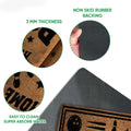 Close-up bowling doormat detail showing printed felt surface and black rubber backing