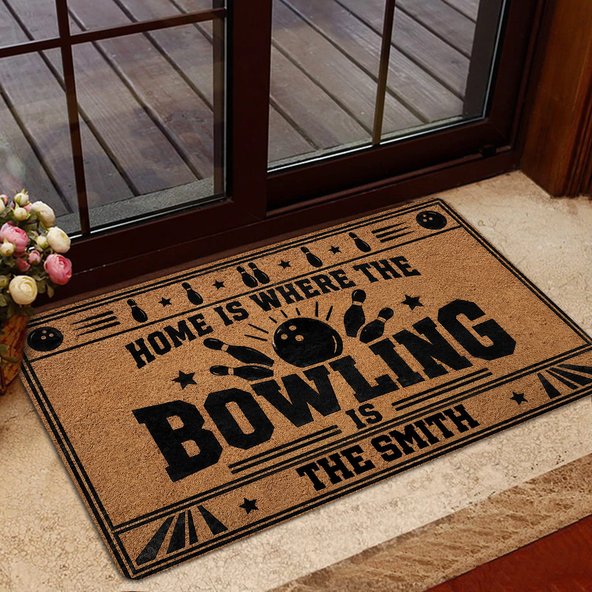 Bowling door mat styled at an indoor entrance with bowling pins, ball and vintage lane design