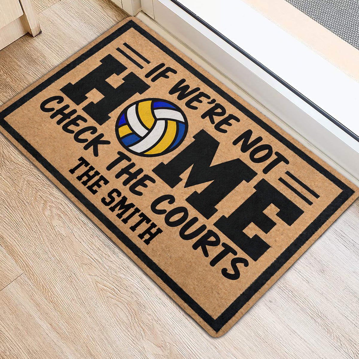 Volleyball court-themed doormat placed near a doorway on a light wood floor