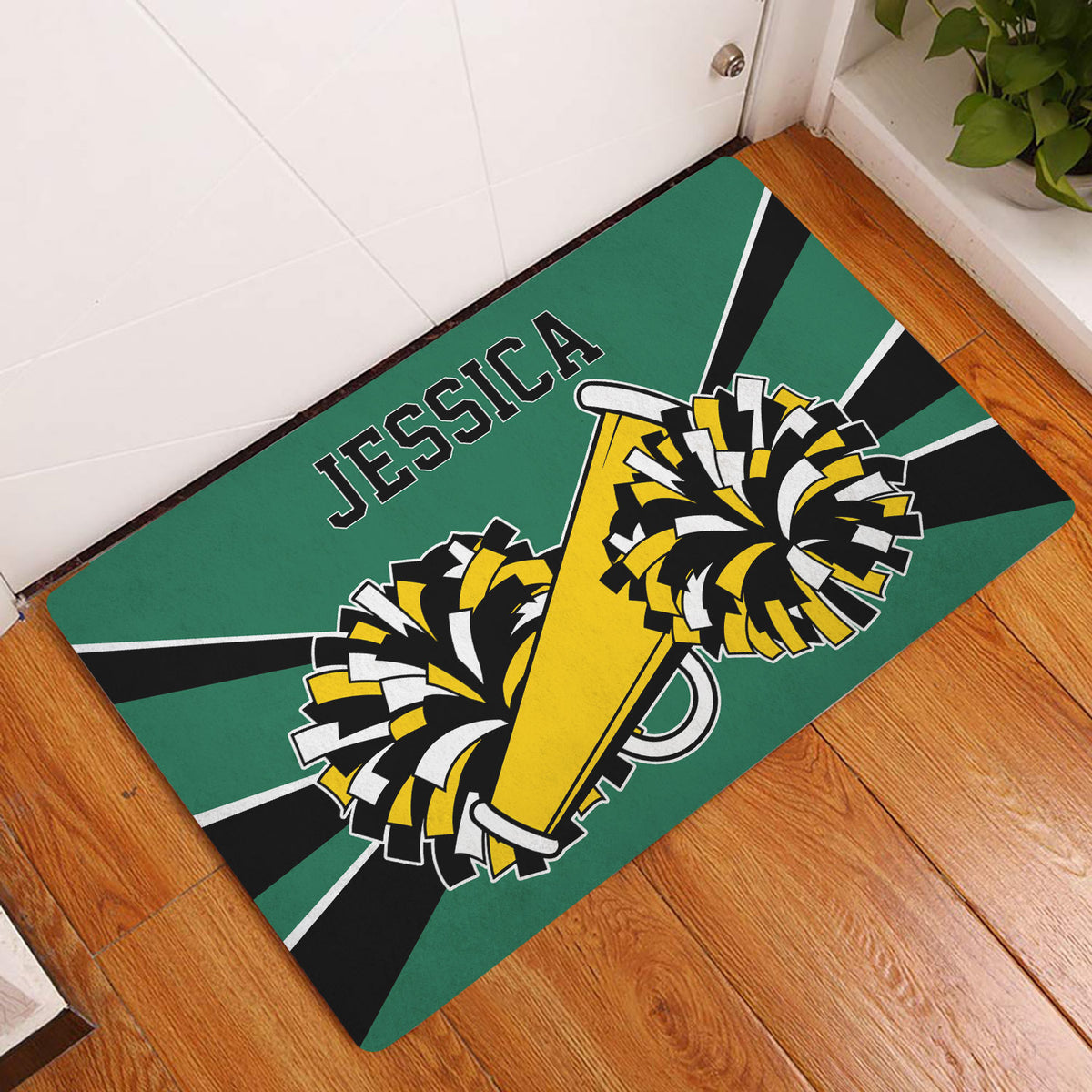 Cheerleading doormat displayed in an entryway with pom-poms and megaphone artwork on a wood floor