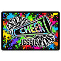 Cheerleading doormat with black and white pom-poms, megaphone, and colorful paint-splatter background