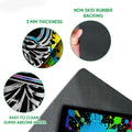 Close-up feature view of cheerleading doormat surface and black rubber backing with traction-focused design