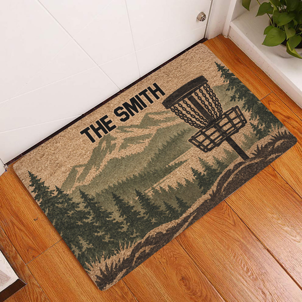 Disc golf doormat displayed in an entryway on a hardwood floor