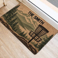 Disc golf basket and mountain forest doormat shown beside an interior doorway