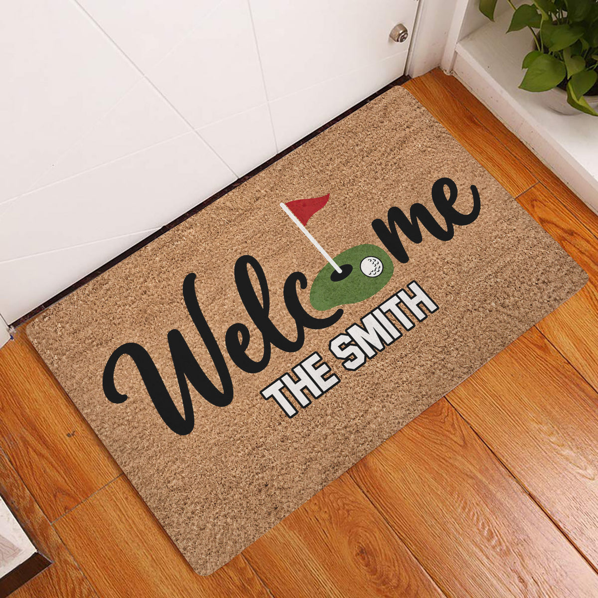 Golf-themed entryway doormat displayed by a white door on a wood floor