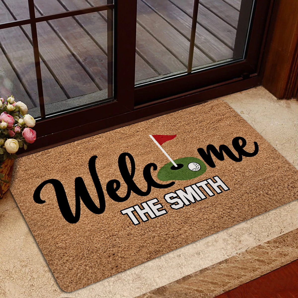 Golf-themed entryway rug displayed near a glass door with a putting green graphic