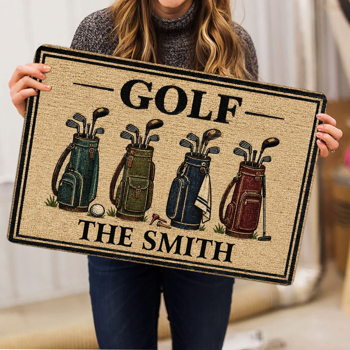 Lifestyle view of a person holding the golf doormat featuring illustrated golf bags and clubs