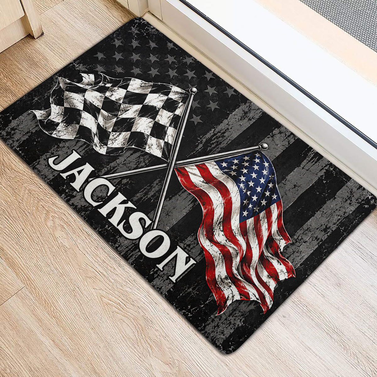 Racing flag doormat placed inside an entryway, featuring checkered and American flags on a distressed design
