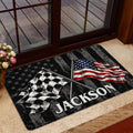 Dirt track racing doormat shown near a glass entry door with crossed racing flags and bold black artwork