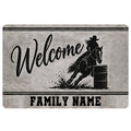 Barrel racing doormat with a horse and rider turning around a barrel in a black and gray design