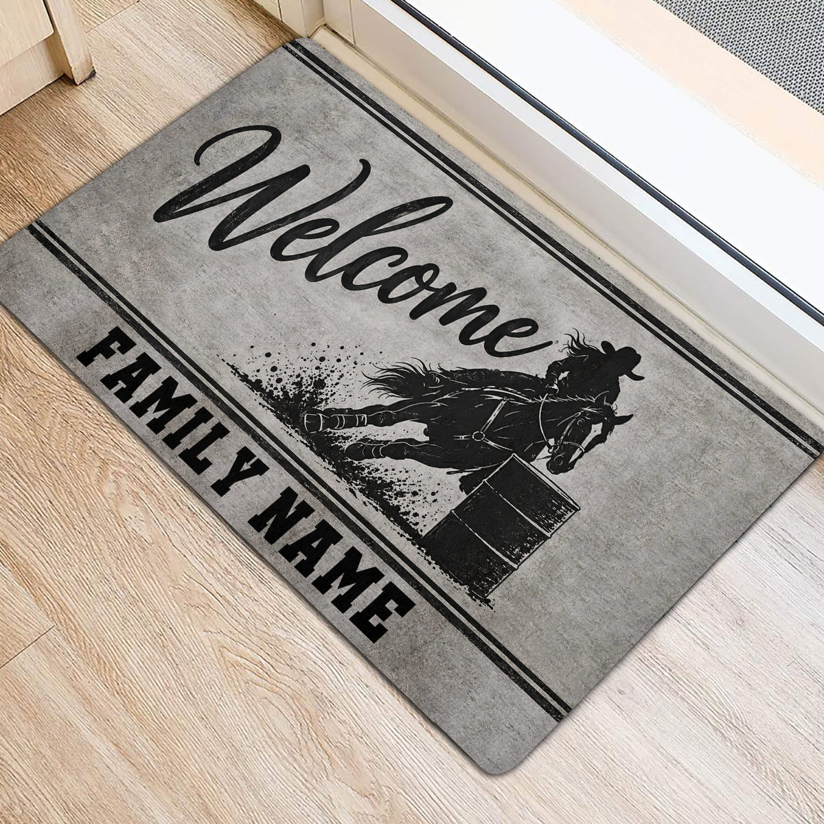 Barrel racing horse and rider doormat positioned by a doorway with a rustic gray design