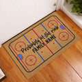 Hockey rink doormat styled at a home entrance on warm wood flooring