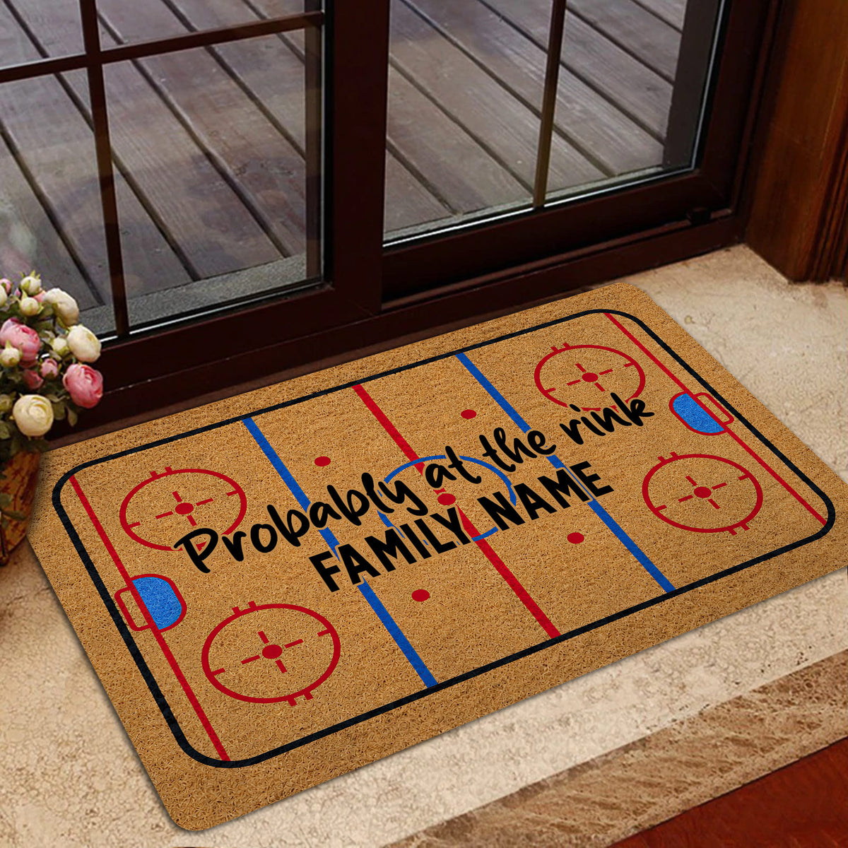 Hockey rink entryway mat displayed near a glass door with a deck visible outside