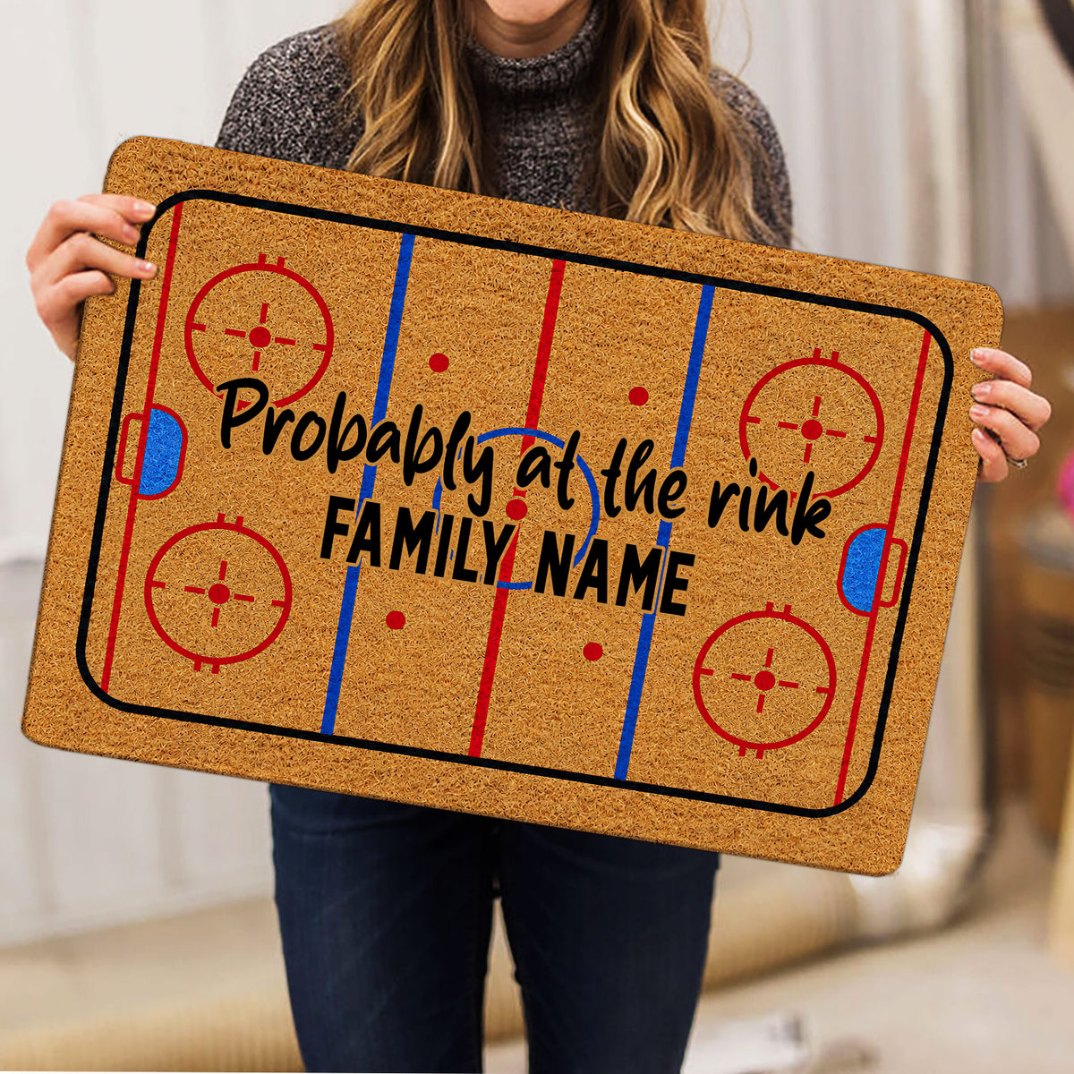 Hockey rink doormat shown in a lifestyle presentation with bold red, blue, and black artwork
