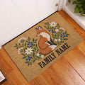 Fox and wildflower doormat displayed at an indoor entryway on a wooden floor