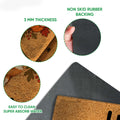 Close-up of fox doormat surface and black rubber backing showing thickness and construction details