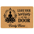 Yoga doormat with a meditating silhouette, lotus flower, leafy wreath, and inspirational black typography