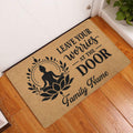 Yoga entryway doormat displayed by a white door on a warm wood floor with a meditating lotus design