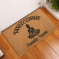 Yoga welcome doormat displayed in an indoor entryway with wood flooring and a meditating figure design