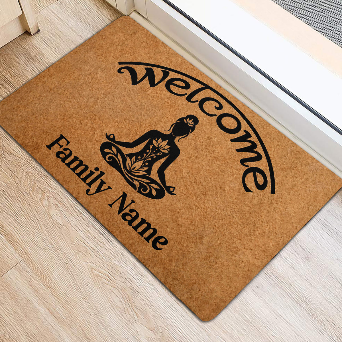 Yoga-themed welcome mat positioned beside an entrance, featuring a meditating figure and warm brown artwork
