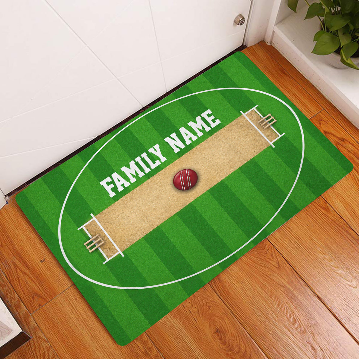 Cricket-themed entryway doormat displayed beside a white door on a wood floor