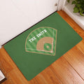 Baseball-themed rug placed by a door on hardwood flooring with a green field and tan infield