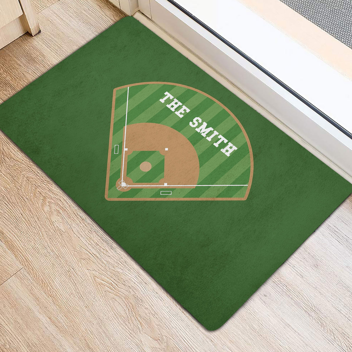 Baseball field doormat displayed at an entryway with green turf tones and a diamond graphic