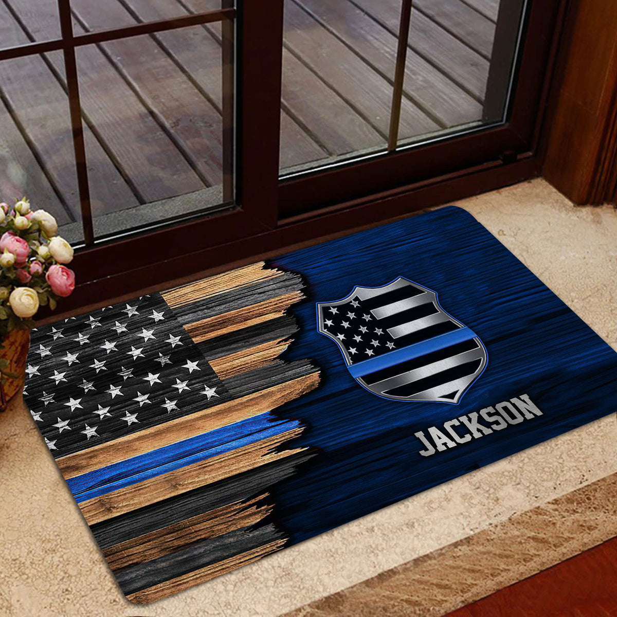 Police-themed blue and black doormat positioned by a glass front door and indoor entryway