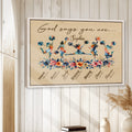 Framed cheerleading wall art displayed on a light wood accent wall in a bright home interior