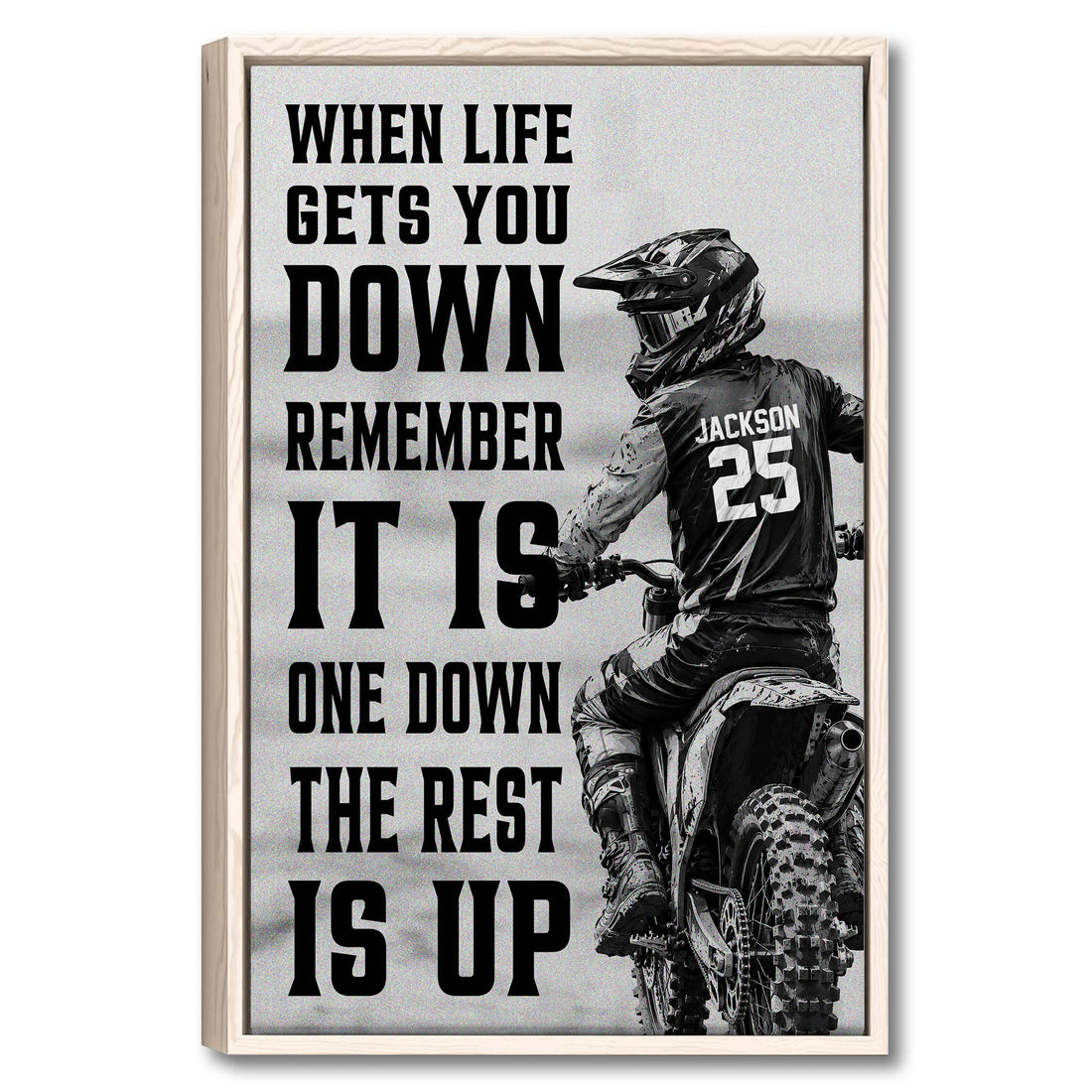 Framed motocross wall art showing a helmeted dirt bike rider with bold black motivational typography
