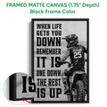 Framed matte canvas motocross wall art shown with a black frame and rider illustration